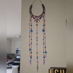 Horseshoe crystal beaded suncatcher with crysral butterfly. One of a kind.